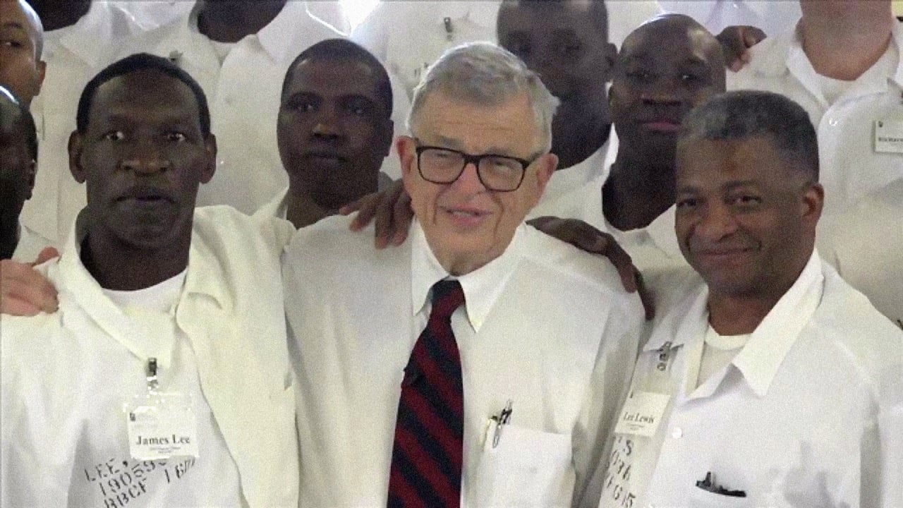 Chuck Colson in his later years with prisoners